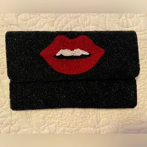 Beaded lip clutch